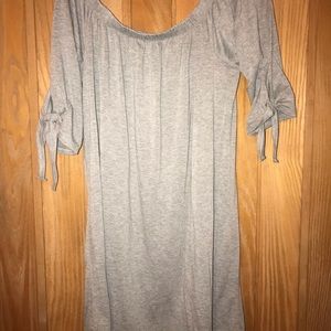 Off the shoulder knee length dress.